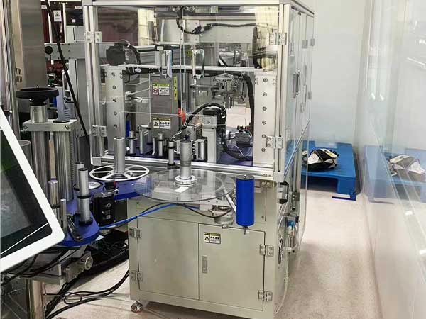 自动贴标机，自动接标机，机械手自动连接标签